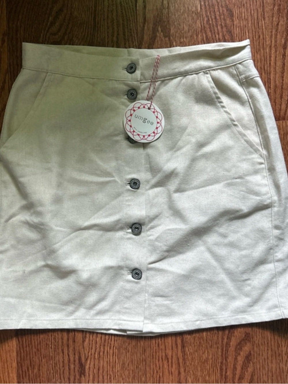 Umgee Cream Button-Front Mini Skirt with Front Pockets